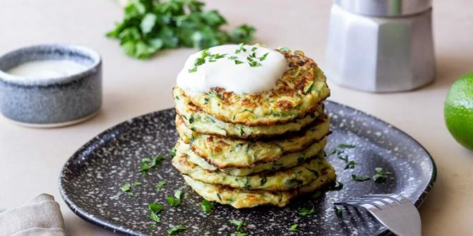 Zucchini pancakes with cheese in the oven
