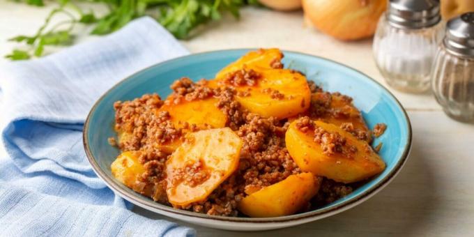 Potatoes with minced meat in a frying pan in Turkish style