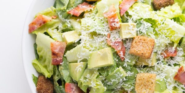 Caesar salad with bacon and avocado