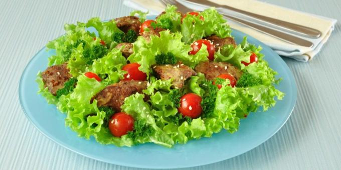 Salad with chicken liver, celery root and tomatoes