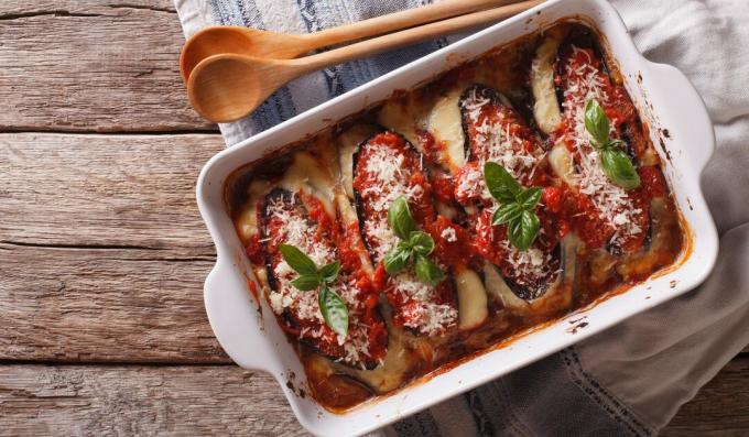 Eggplant in marinara sauce stuffed with vegetables and cheese