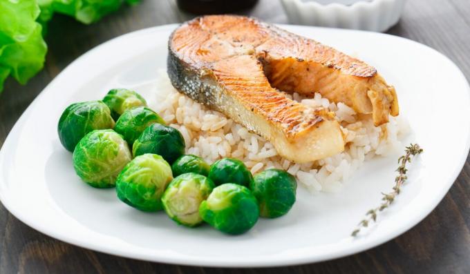 Baked salmon fillet with rice, Brussels sprouts and yoghurt sauce