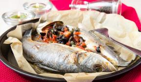 Seabass baked with olives, tomatoes and fennel