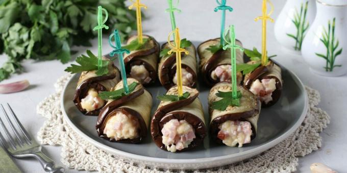 Eggplant rolls with cheese, sausage and sweet pepper