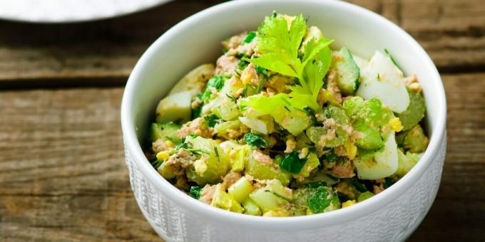 Salad with cod liver, eggs, potatoes and cucumbers