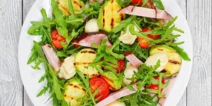 Salad with zucchini, meat and tomatoes