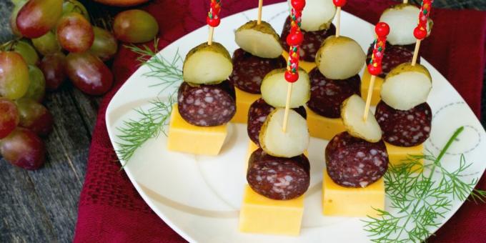 Canape with sausage, potatoes and cheese