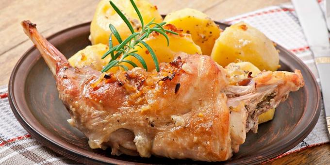 Rabbit in the oven with onions and potatoes: a simple recipe